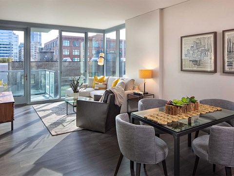 a living room with a couch and a table