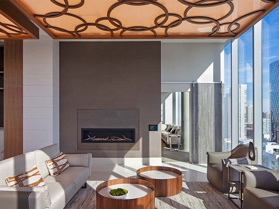 a living room with a couch and a fireplace