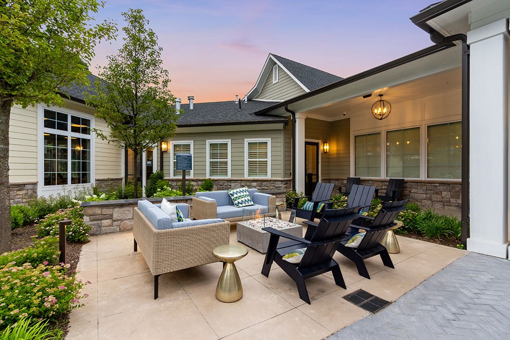 Outdoor patio with fire table and soft seating