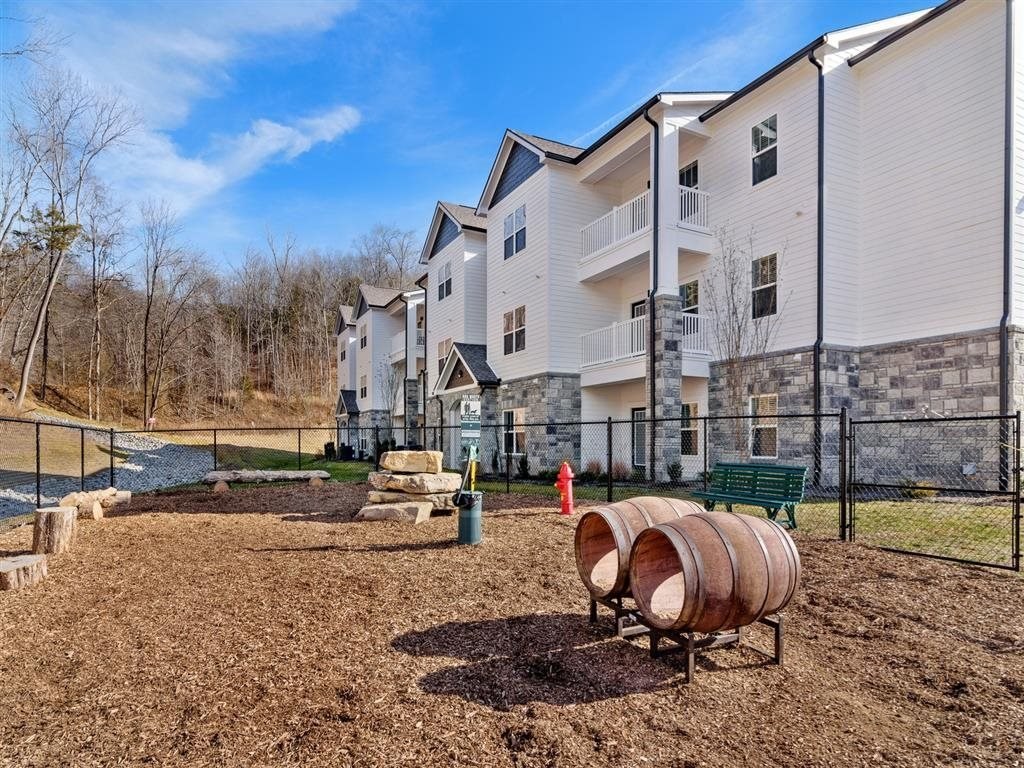 the preserve at ballantyne commons dog park with a fire hydrant and benches