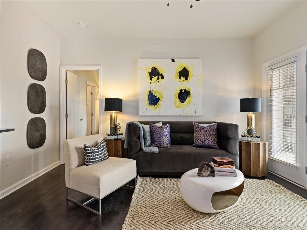 a living room with a couch and a table