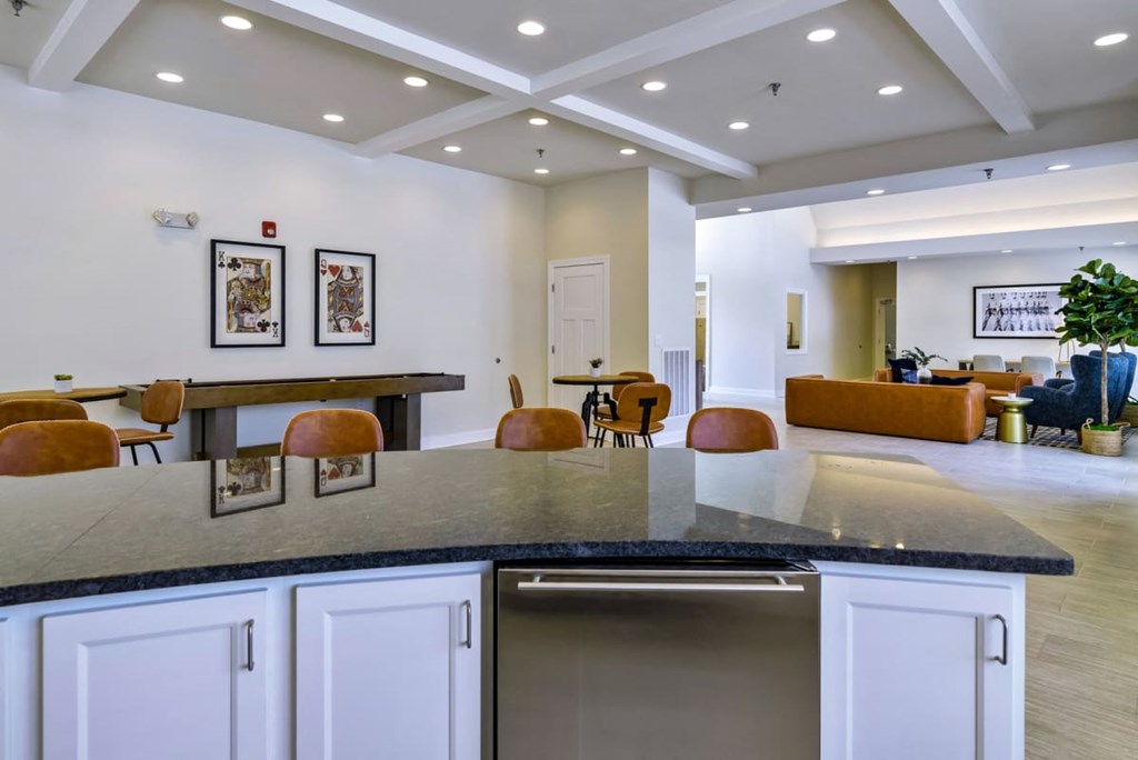 Ashland Farms Resident Clubhouse with Modern Decor, Shuffleboard, and Various Table Seating