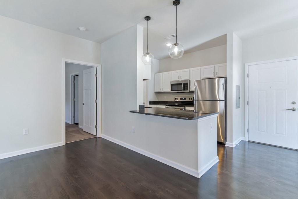 Ashland Farms Open Kitchen Layout with Island, Modern Light Fixtures, and Quartz Counters