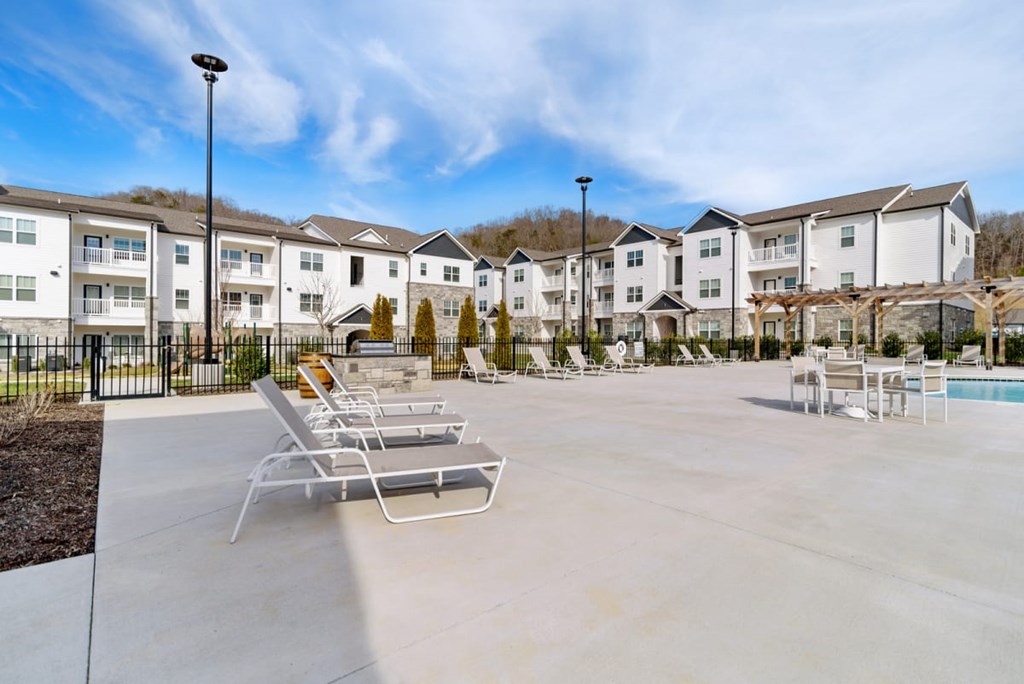 Ashland Farms Expansive Swimming Pool Area with Sundeck and Shaded Table Seating