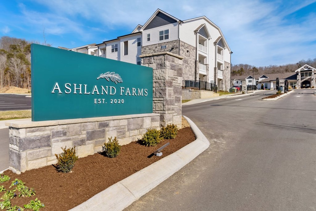 a building with a sign that reads farms