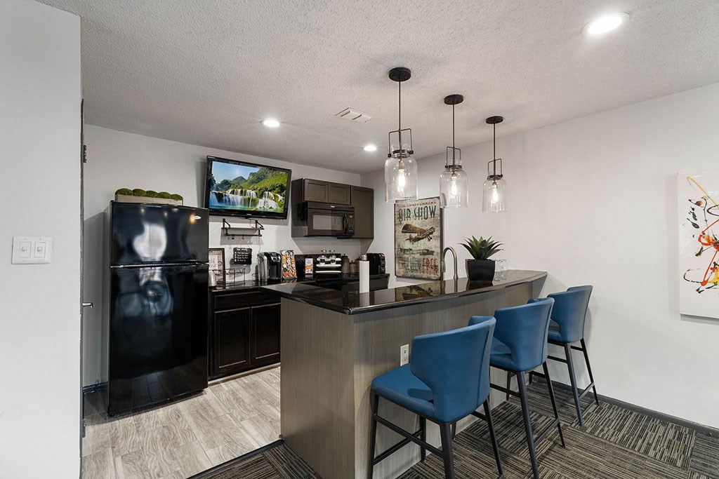 our apartments offer a kitchen with a breakfast bar and modern appliances