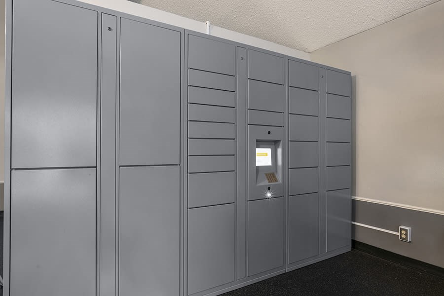 a row of gray lockers in a room