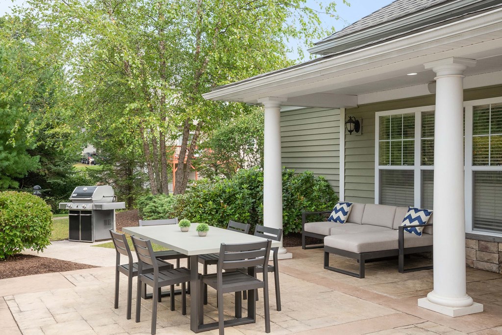 the lobby of a restaurant with a black cat