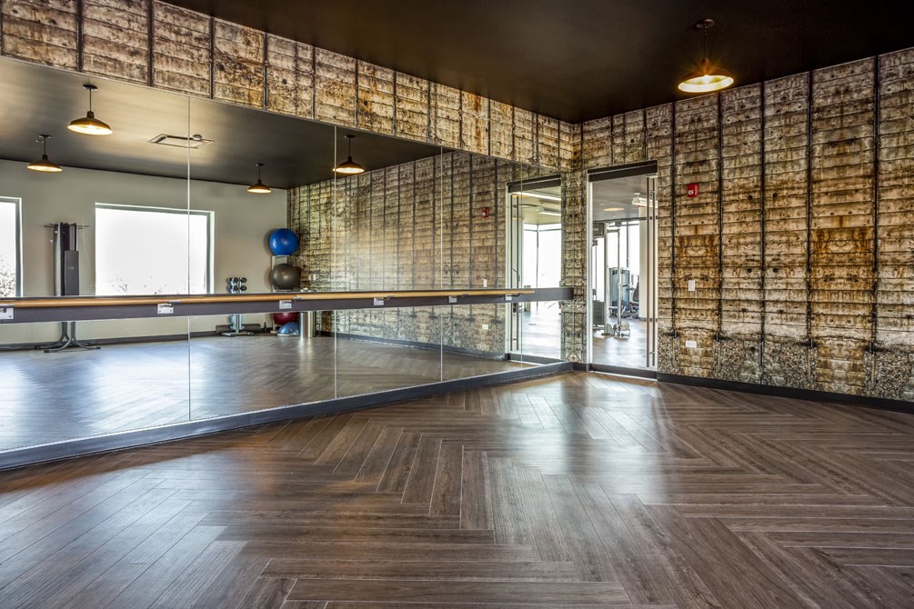 a large room with mirrored walls and a dance floor