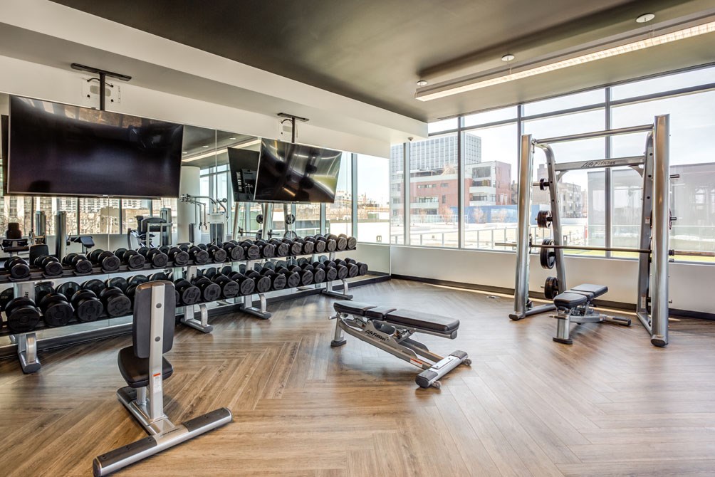 a view of a store with a bunch of shoes on the floor