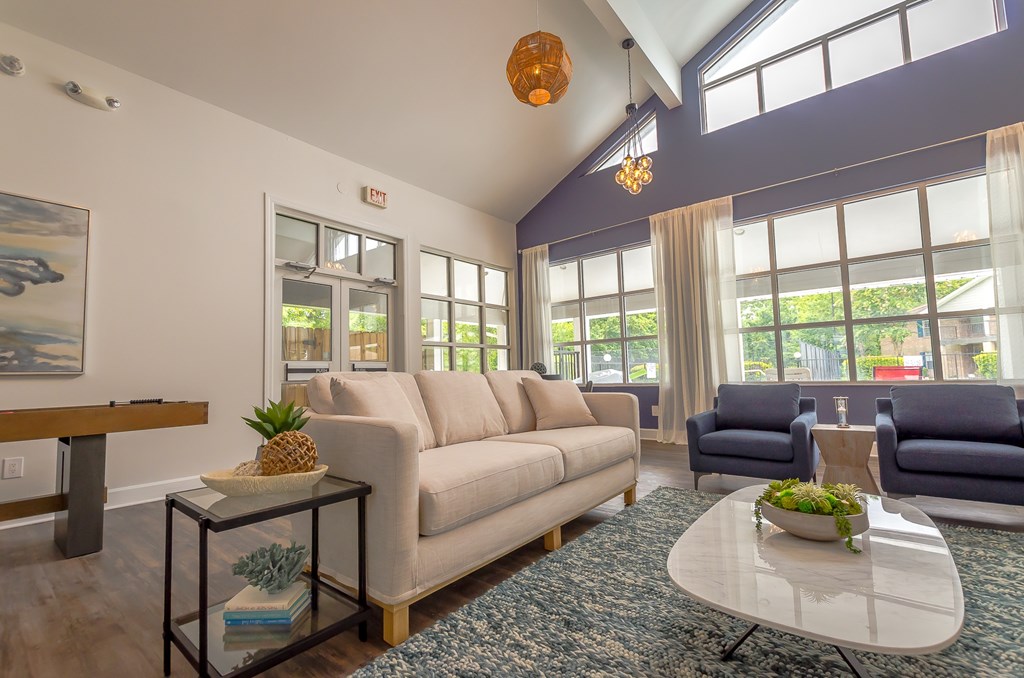a living room with a couch and a coffee table