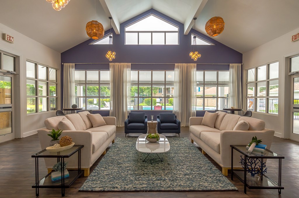 a living room with two couches and a coffee table