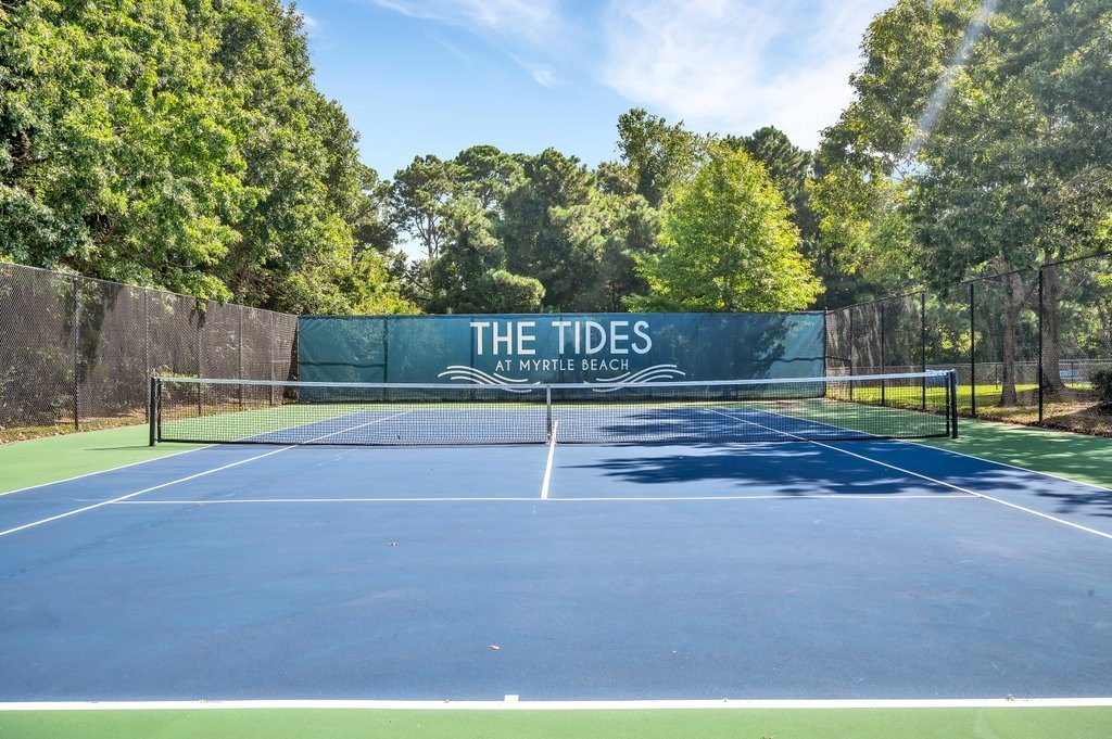 a tennis court at the tides apartments