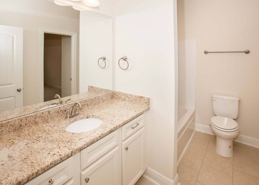 a bathroom with a sink and a toilet