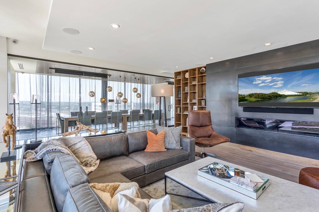 a living room with a couch and a tv