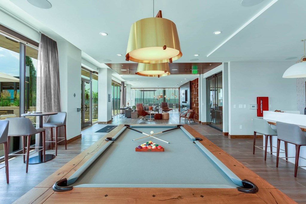 a pool table in the middle of a room