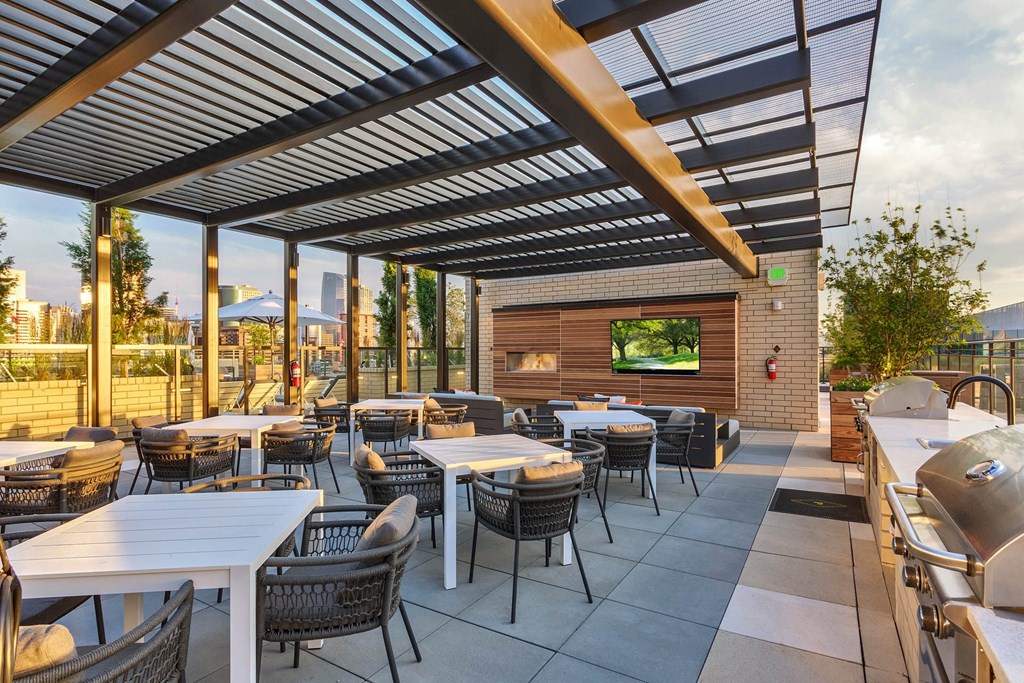 a patio with tables and chairs at a restaurant
