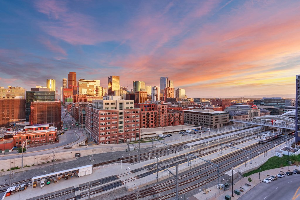 a view of the city skyline at sunset