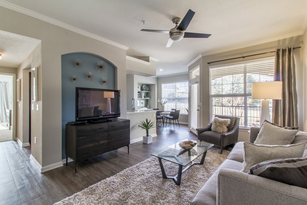 a living room with a couch and a tv