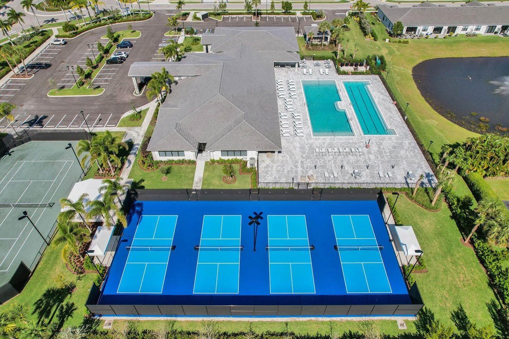 arial view of the pool and tennis court of the resort