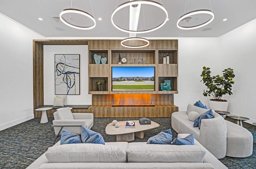 a living room with couches and a fireplace