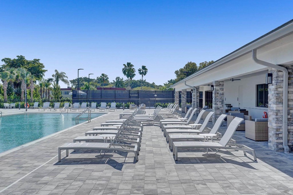 the pool area at the resort at longboat key club