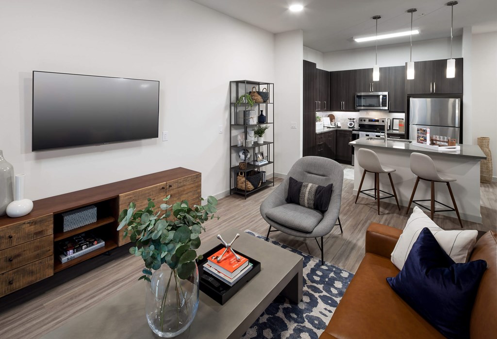 a living room and kitchen in a model home