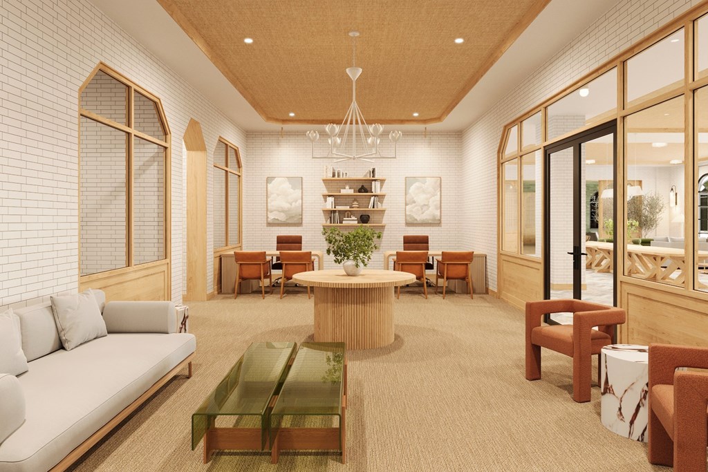 a rendering of a lobby with furniture and a table