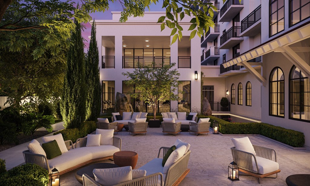 a rendering of a courtyard with couches and chairs