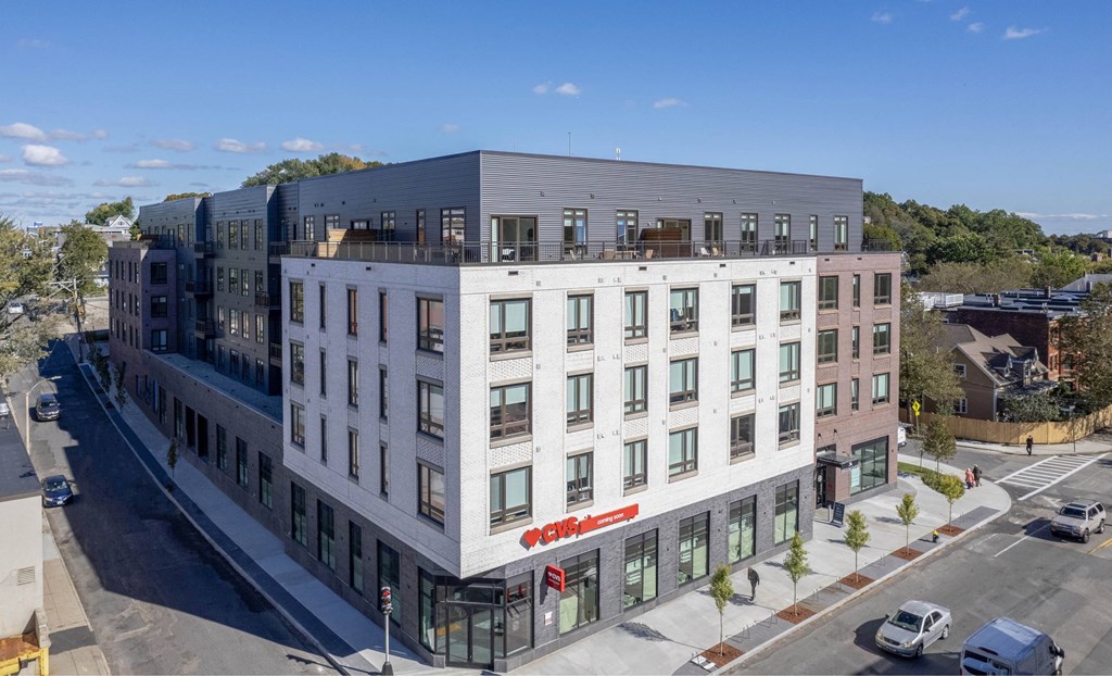 an aerial view of a large building with many windows