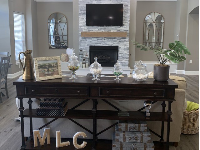 a group of wine glasses sitting on top of a table