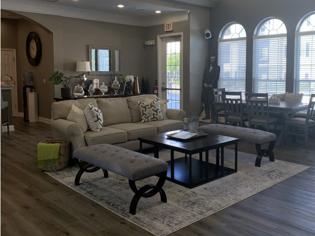 a living room with a couch and a coffee table
