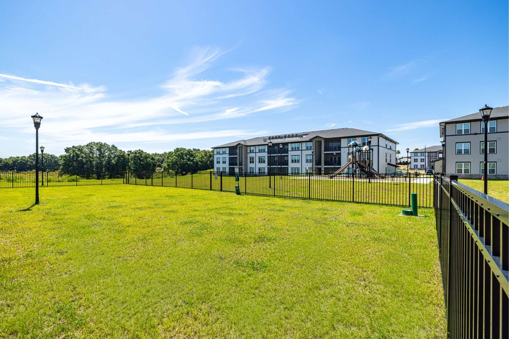 Fenced community dog park at The Groves at Lake Juliana Fenced community dog park at The Groves at Lake Juliana
