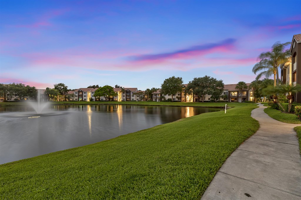the walkway around the lake at the preserve at sunset