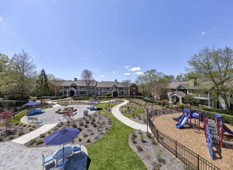a backyard with a playground and a park