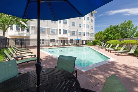 Pool View from Seating Area Under Umbrella | Canton Woods