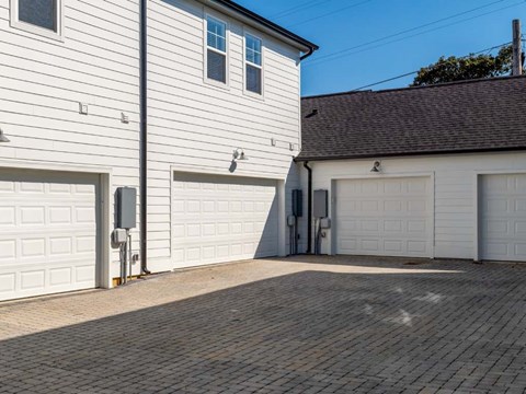 A house with a garage door opener on the left side.