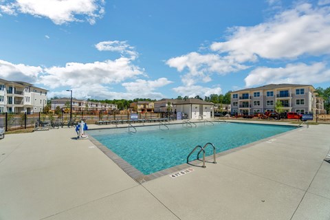 the swimming pool at the preserve at polk apartments