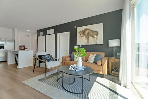 a living room with a couch and a table