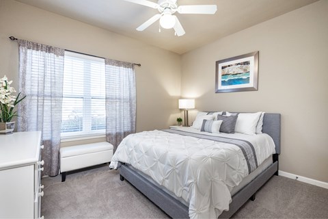 Big oaks apartments lakeland florida furnished bedroom with ceiling fan and carpet