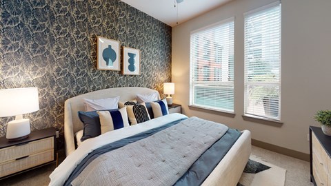 A bedroom with a large bed at L2 Uptown in Dallas Texas