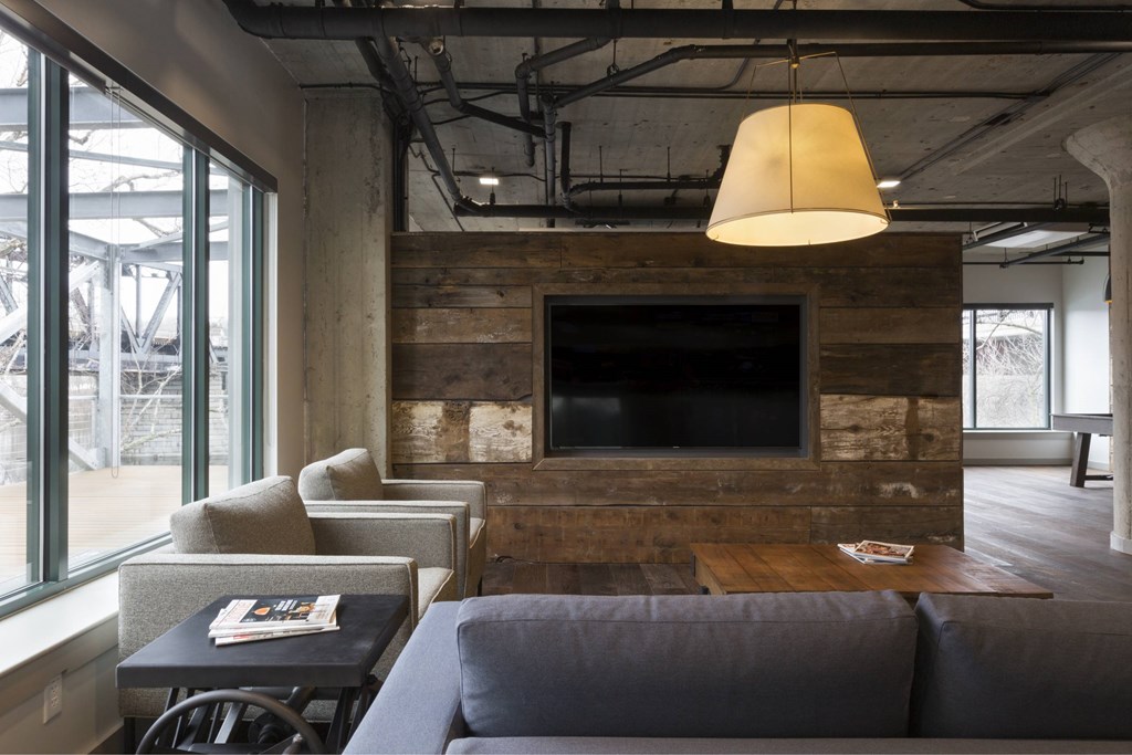 A living room with a fireplace and a couch.