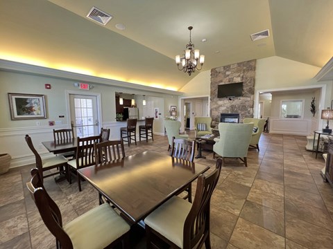 Garden-Style Apartments in Northampton, PA with In-Unit Washer and Dryer - Residences at Willow Ridge - A Clubhouse with Tile Flooring, and a Stone Fireplace.