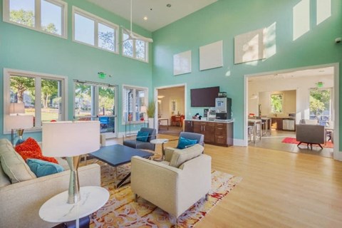 a living room with a couch and a table