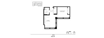 A floor plan of a living space with a kitchen and two bathrooms.