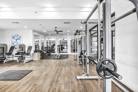 A gym with a variety of equipment at Markethaus 3700 in Plano Texas