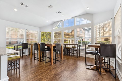 A large room with tables and chairs at Towns at Chapel Hill in Plano Texas