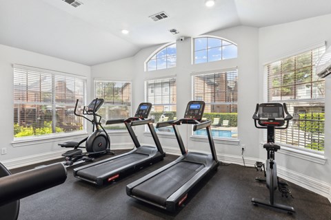 Gym with treadmills at Towns at Chapel Hill in Plano Texas