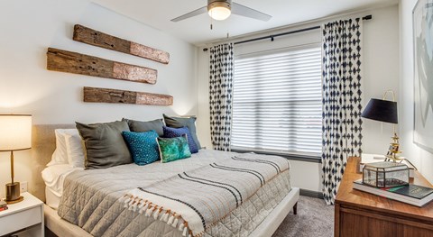 Bright bedroom at Twin Creeks Crossing, one bedroom apartments in Allen, TX