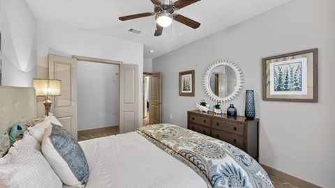 Comfortable bedroom at The Carson at Twin Creeks, Allen apartments